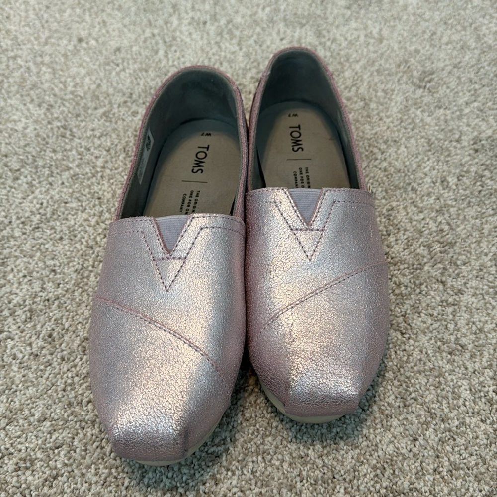 Toms Women’s Pink Metallic Canvas Slip Ons